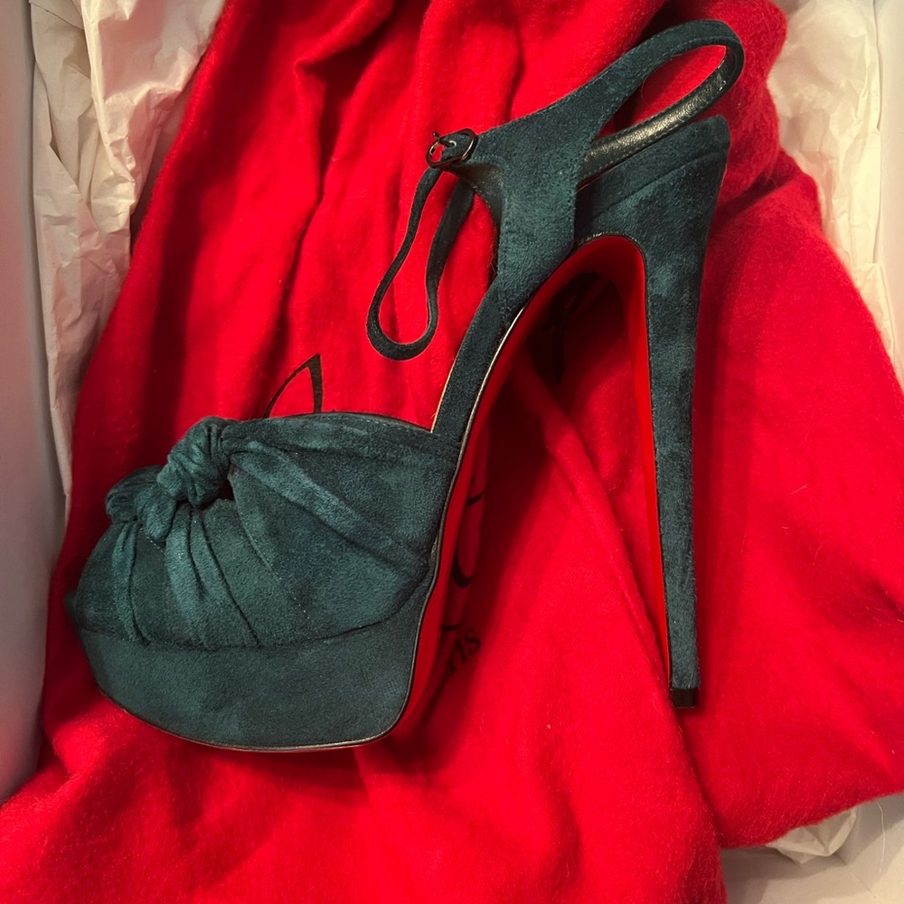 This beautiful Louboutin shoes I can’t wear anymore. It’s so high for me.